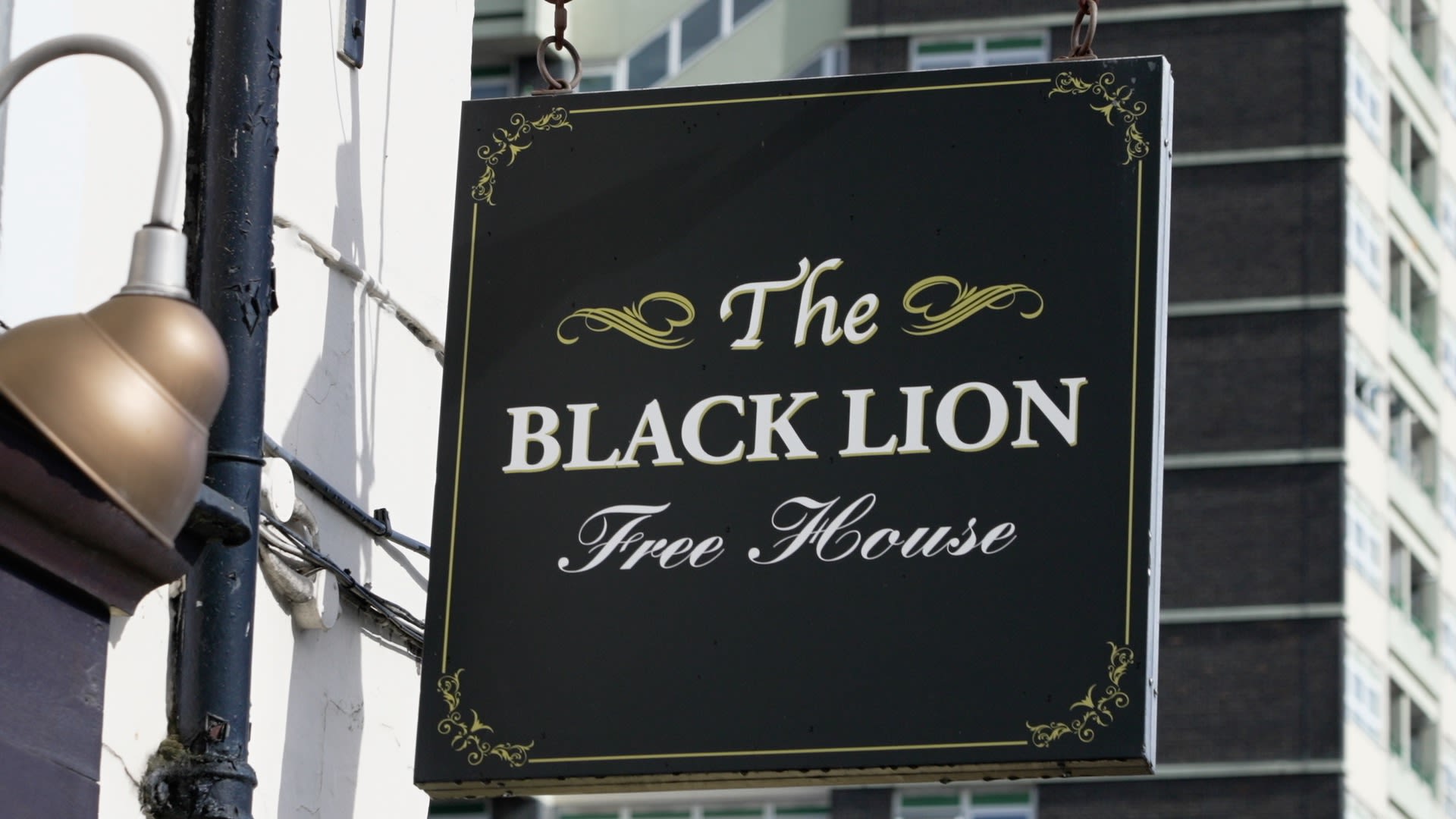 IMAGE OF THE BLACK LION PUB SIGN
